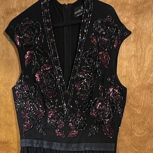 Needle and thread embroidered tulle gown